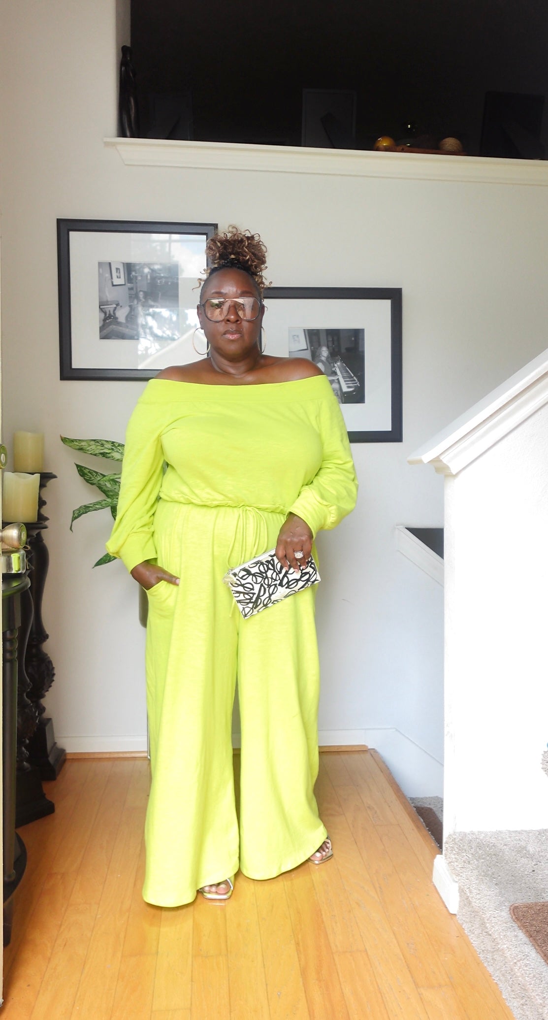 Off the shoulder, long sleeve, wide legged jumpsuit.